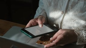 Online shopping, payment processing. Woman paying online using bank card and smartphone. Transaction confirmation on mobile phone screen.  - Powered by Shutterstock - Get 15% off with code: PIKWIZARD15