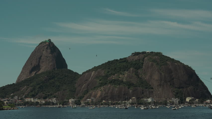Pão de Açúcar mountain in Rio de Janeiro. Bread of sugar mountain with cable cars. Moving cableway