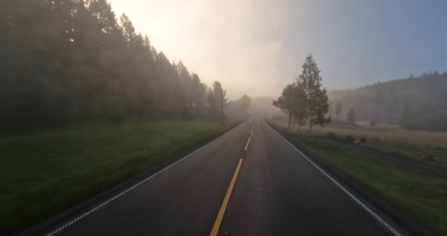 Fog on a Norway road. POV car trip. Vehicle point-of-view Driving a Car on a Road in Norway.