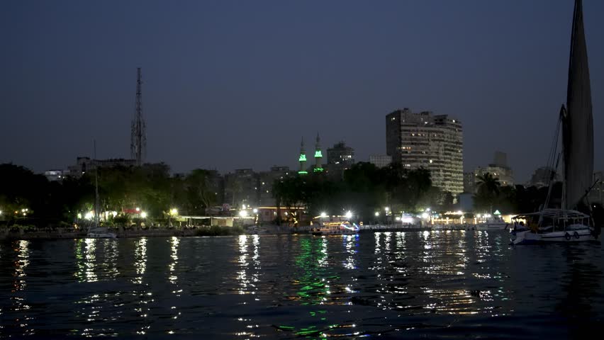 View from a sailboat on the Nile River in Cairo, Egypt at nighttime
