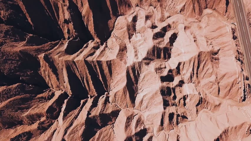 Aerial view of rocks, mountainous landscape, road to Valparaiso, Chile. (aerial photography)