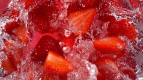 Super Slow Motion Shot of Strawberry Cuts Followed by Camera Splashing into Water at 1000 fps. - Powered by Shutterstock - Get 15% off with code: PIKWIZARD15