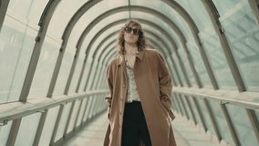 Stylish Young Man Fashion Model In Glass Tunnel. - Powered by Shutterstock - Get 15% off with code: PIKWIZARD15