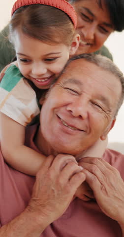 Love, grandparents and playing with girl, happiness and home with fun, funny and bonding together. Family, old man and elderly woman with grandchild, kid or laugh with joy, smile and relax on a break