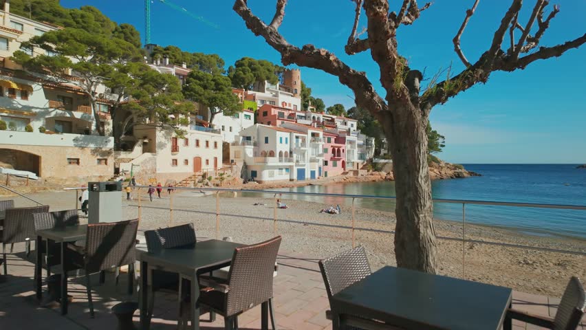 Picturesque village of Sa Tuna on the Costa Brava Mediterranean coast near Begur, Catalonia, Spain. Revealing slow motion footage of an idyllic beach on the Costa Brava coast in summer.