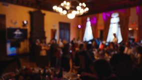 Slow motion footage shows elegant banquet hall with stunning chandeliers, creating sophisticated, luxurious atmosphere - Powered by Shutterstock - Get 15% off with code: PIKWIZARD15