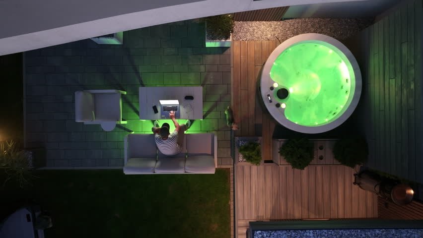 Relaxing Evening In A Backyard Hot Tub