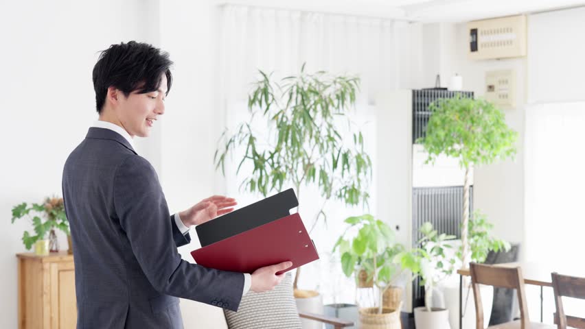 Businessman giving a tour of real estate