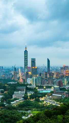 Vertical video. Time lapse of Taipei city at night, Taiwan.