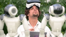Laboratory technician in a white coat with virtual reality headset looking around near humanoid robot in a greenhouse farm - Powered by Shutterstock - Get 15% off with code: PIKWIZARD15