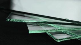 Sheets of Factory manufacturing tempered clear float glass panels cut to size. - Powered by Shutterstock - Get 15% off with code: PIKWIZARD15
