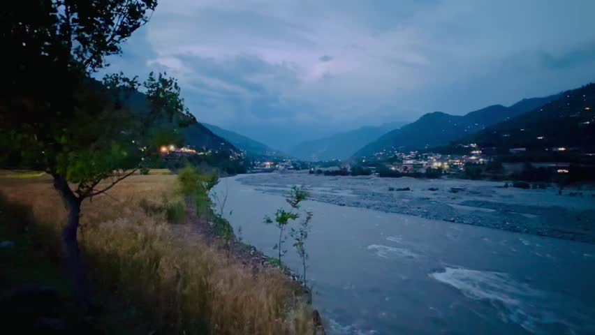 Sunset time at a falling river in valley