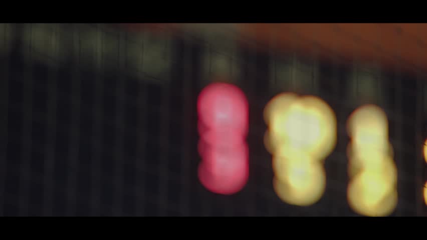 Lively Baseball Game and Electronic Display at the Stadium