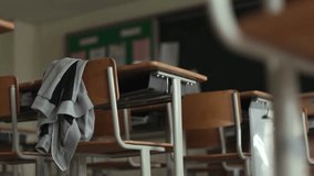 Empty Classroom with Sunlight and Desks - Powered by Shutterstock - Get 15% off with code: PIKWIZARD15