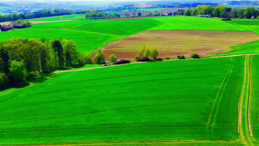 Aerial View of Diverse Agricultural Fields with Trees and Rural Landscape