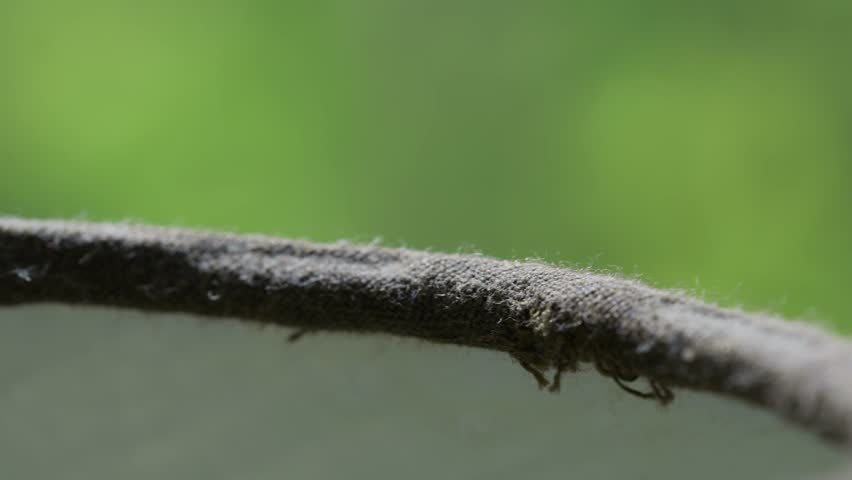 Macro footage of fabric on a lamp. Edges of a lamp. Extreme close up footage of an object. 
