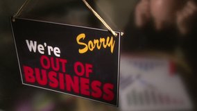 Out of business, man in back - Powered by Shutterstock - Get 15% off with code: PIKWIZARD15