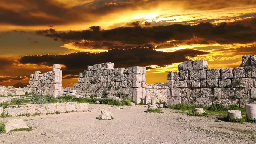 Amman city landmarks-- old roman Citadel Hill, Jordan. Against the background of the sunset. 4K, time lapse 