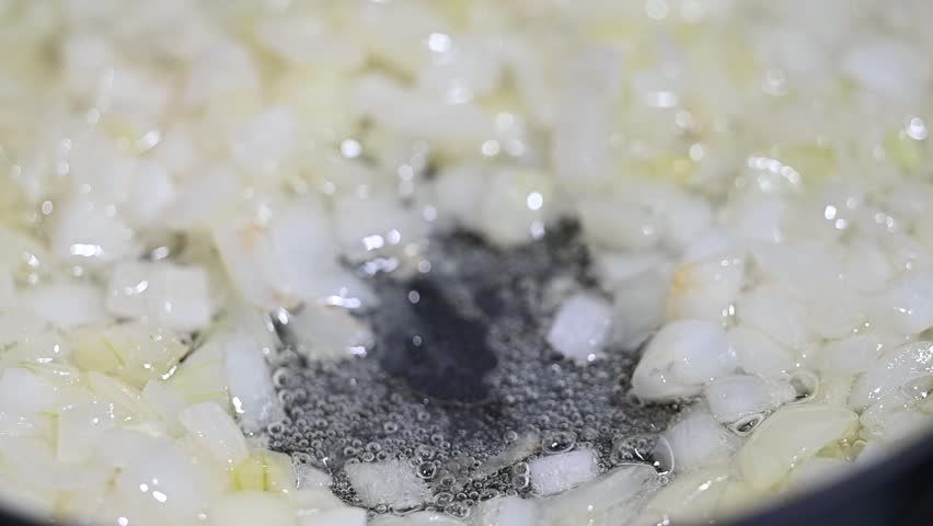 onions fried in a frying pan