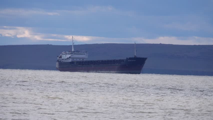 Russia, Anadyr. An old cargo ship is on the roadstead