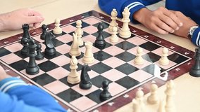 college student teenagers playing chess - Powered by Shutterstock - Get 15% off with code: PIKWIZARD15