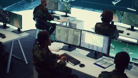 Army officer establishing new operating bases through a world map satellite vision, ensure the connectivity to the power base command center. Commander operates CCTV radar footage. Camera B. - Powered by Shutterstock - Get 15% off with code: PIKWIZARD15