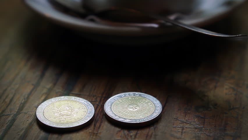 Waiter Picking Up Peso Coins in Argentine Cafe in Buenos Aires, Argentina, Close Up - 4K