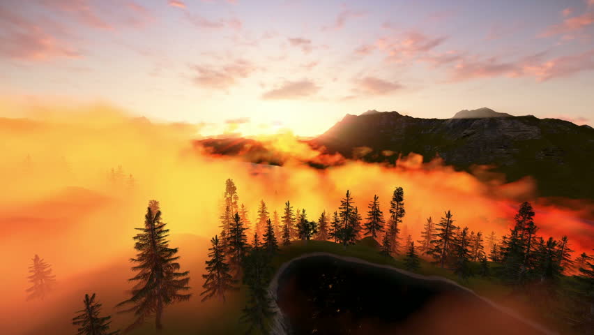 Beautiful sunrise in the mountains with mist
