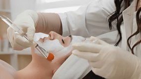 Indulge in a luxurious spa session with a professional facial treatment, including a rejuvenating white mask applied by a skilled cosmetologist for pampering and revitalizing your skin - Powered by Shutterstock - Get 15% off with code: PIKWIZARD15