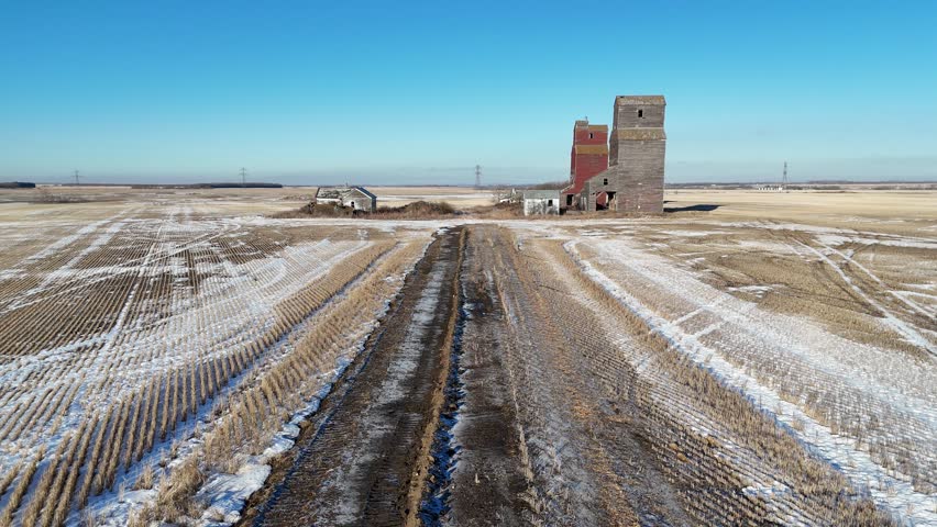 Aerial Drone Video of Lepine, SK in Winter - Abandoned Grain Elevators, Snow-Covered Landscape, and Rural Scenery