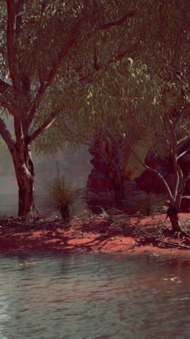 Reflection in Colorado River of Butte catching days last rays, in Grand Canyon.