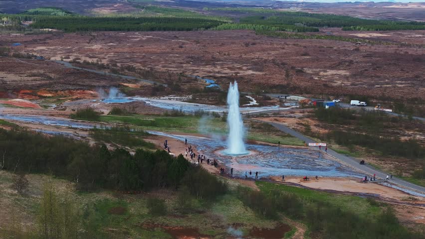 Geothermal area of Strokkur in Iceland with hot boiling thermal water smoke. Spectacular geotermal eruption of Geysir