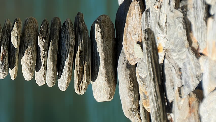 Stones stacked into a Cairn - macro pedestal up in vertical orientation