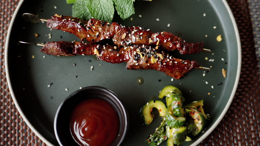 Close up of a Yakitori with chicken dish at a restaurant