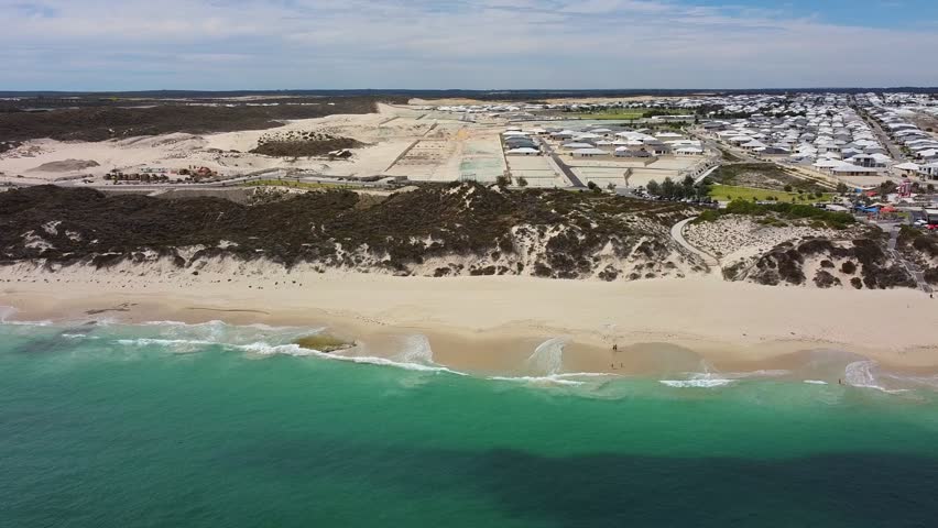 Aerial view over ocean at Amberton Beach suburb in Perth