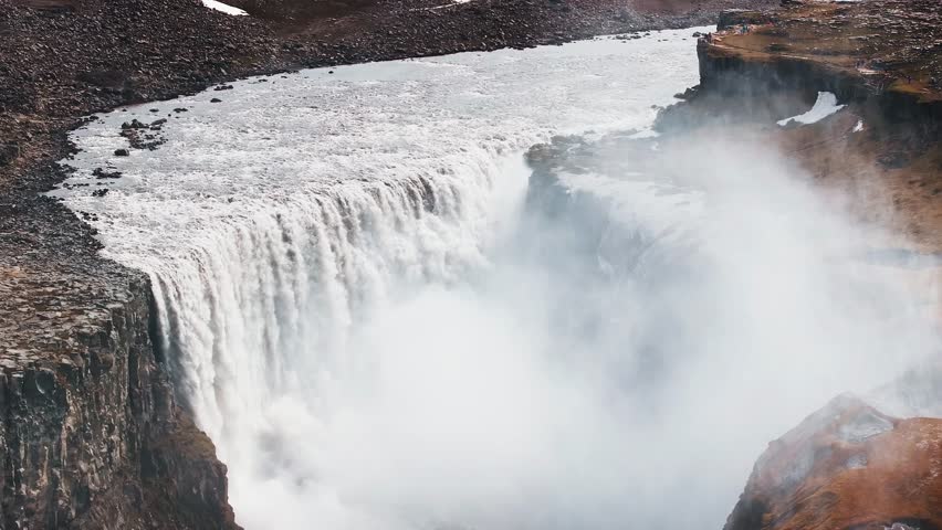 Aerial view of the Dettifoss Waterfall in Jokulsarglijufur National Park in Iceland. The Jokulsa-a-Fjollum River cascades 134m into the 500m wide canyon. Most powerful waterfall in Europe