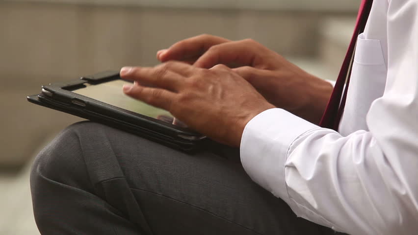 Businessman hands typing on a laptop