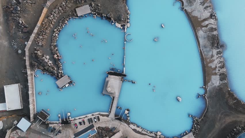 Aerial view of the Blue lagoon in Iceland. The most famous and popular SPA place in Iceland. Landscape from air. Vacation image. Blue and hot water in geothermal lake.