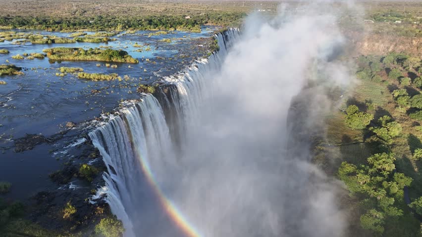 Scenic Water Fall At Victoria Falls In Matabeleland North Zimbabwe. Nature Waterfall. Zambezi River Landscape. Victoria Falls At Matabeleland North Zimbabwe. Southern Africa. Tourism Travel.