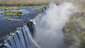 Scenic Water Fall At Victoria Falls In Matabeleland North Zimbabwe. Nature Waterfall. Zambezi River Landscape. Victoria Falls At Matabeleland North Zimbabwe. Southern Africa. Tourism Travel. - Powered by Shutterstock - Get 15% off with code: PIKWIZARD15