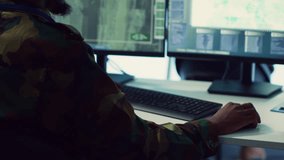 Soldier implements and processes tactical data with reconnaissance radar system, creating comprehensive battlefield maps to aid troops in the operational field. Intelligence for a mission. Camera A. - Powered by Shutterstock - Get 15% off with code: PIKWIZARD15