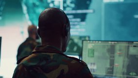 Army personnel applying national safety protocols by verifying all ships anchoring in the coastal ports, using radar surveillance on big screen in military command post. Federal operations. Camera A. - Powered by Shutterstock - Get 15% off with code: PIKWIZARD15