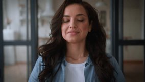 Happy Caucasian smiling woman practicing yoga calm peace lady female girl meditation at home sitting on couch in living room in lotus position relaxing with closed eyes mindful meditation health care - Powered by Shutterstock - Get 15% off with code: PIKWIZARD15