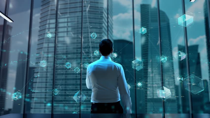 What's New. Businessman Working in Office among Skyscrapers. Hologram Concept