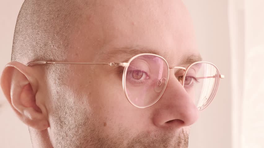 young man with glasses, Male Brown Eyes, Caucasian man looking, Masculine beauty, vision examination, myopia, eye fatigue, color perception