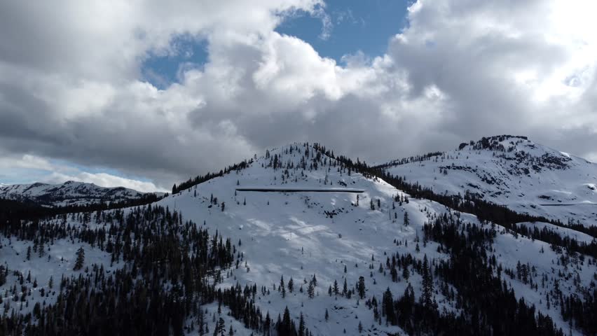 Clouds Passing Over Snowy Sierra Nevada Mountains Near Truckee, California