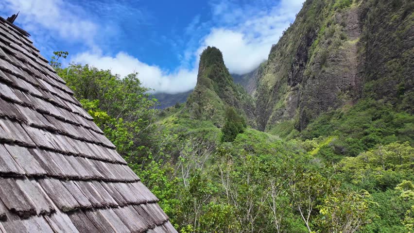 Īao Valley is a lush, stream-cut valley in West Maui, Hawaii, located 3.1 miles west of Wailuku.