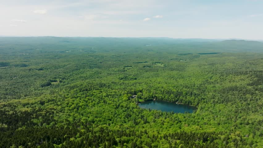 Drone footage of New Hampshire looking at a lake