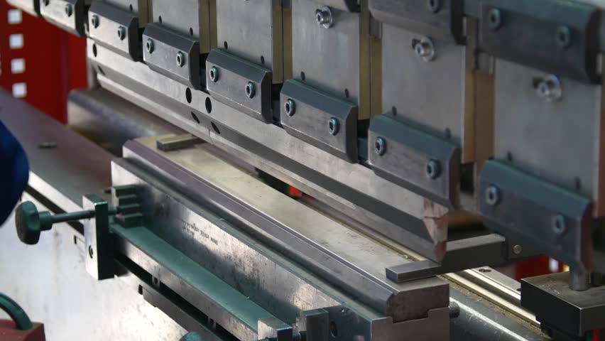 Factory hydraulic press. Stamping of sheet steel parts on a hydraulic press. Stamping on the press. 