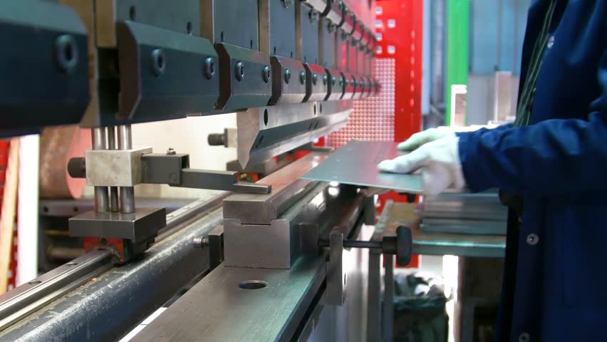 Factory hydraulic press. Stamping of sheet steel parts on a hydraulic press. Stamping on the press. 